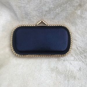NWOT Metallic Blue Clutch With Gold Accents